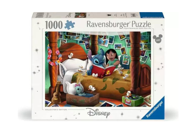 Ravensburger Disney puzzle box with cartoon characters on a bed