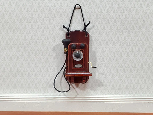 Vintage-style wall-mounted phone on a textured white wall.